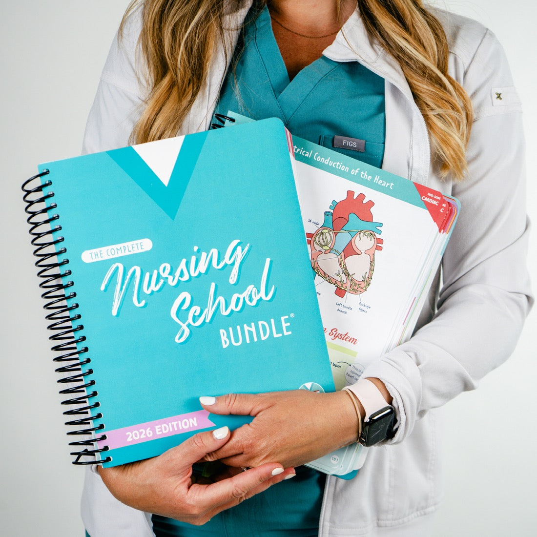 A nurse holding The Complete Nursing School Bundle and a visual notes page